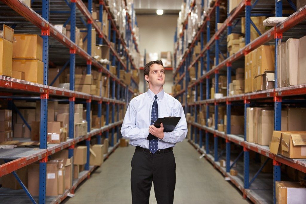 man monitoring the warehouse