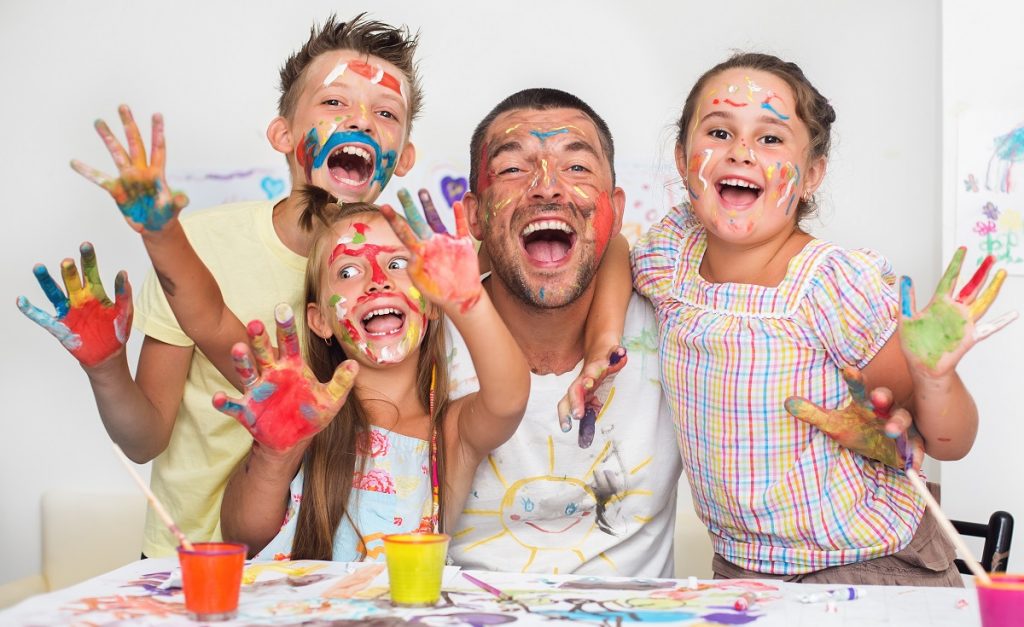 Dad playing with kids