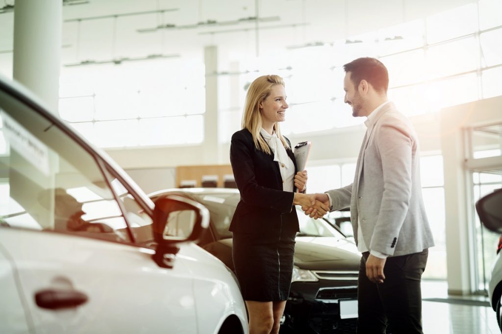 sales agent shake hands with customer