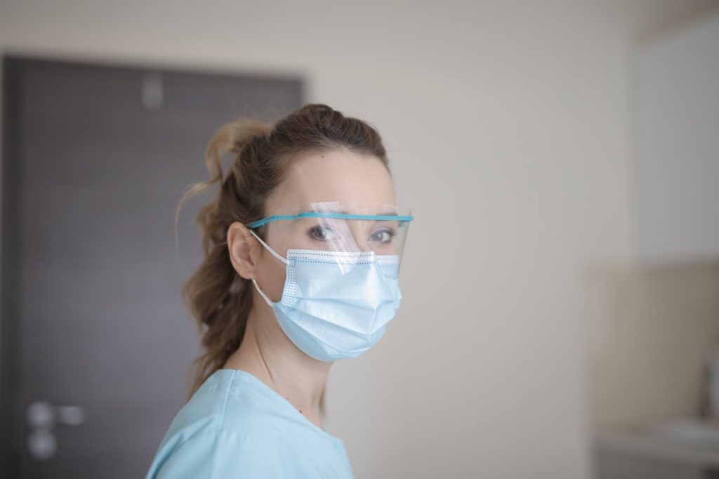 a nurse wearing a mask