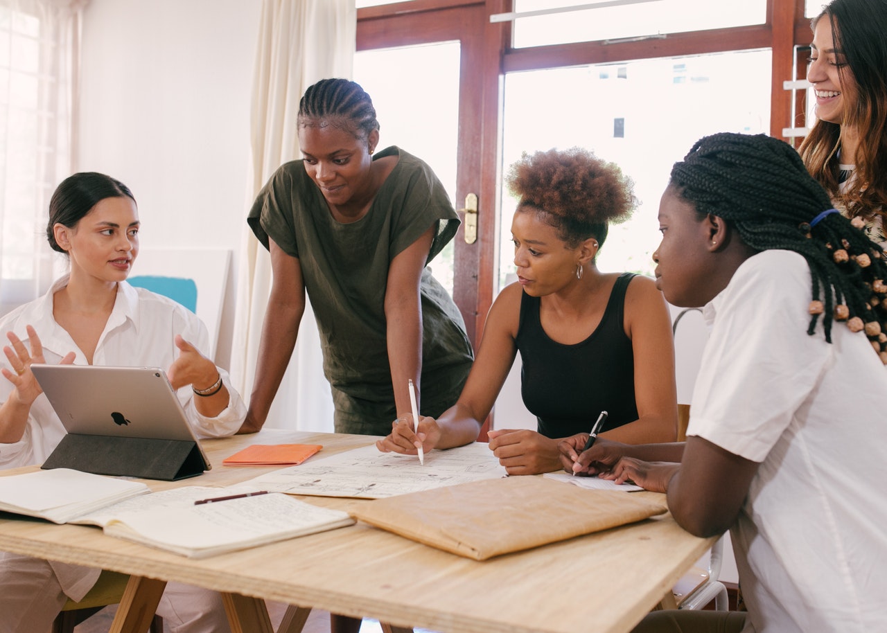 women discussing ideas