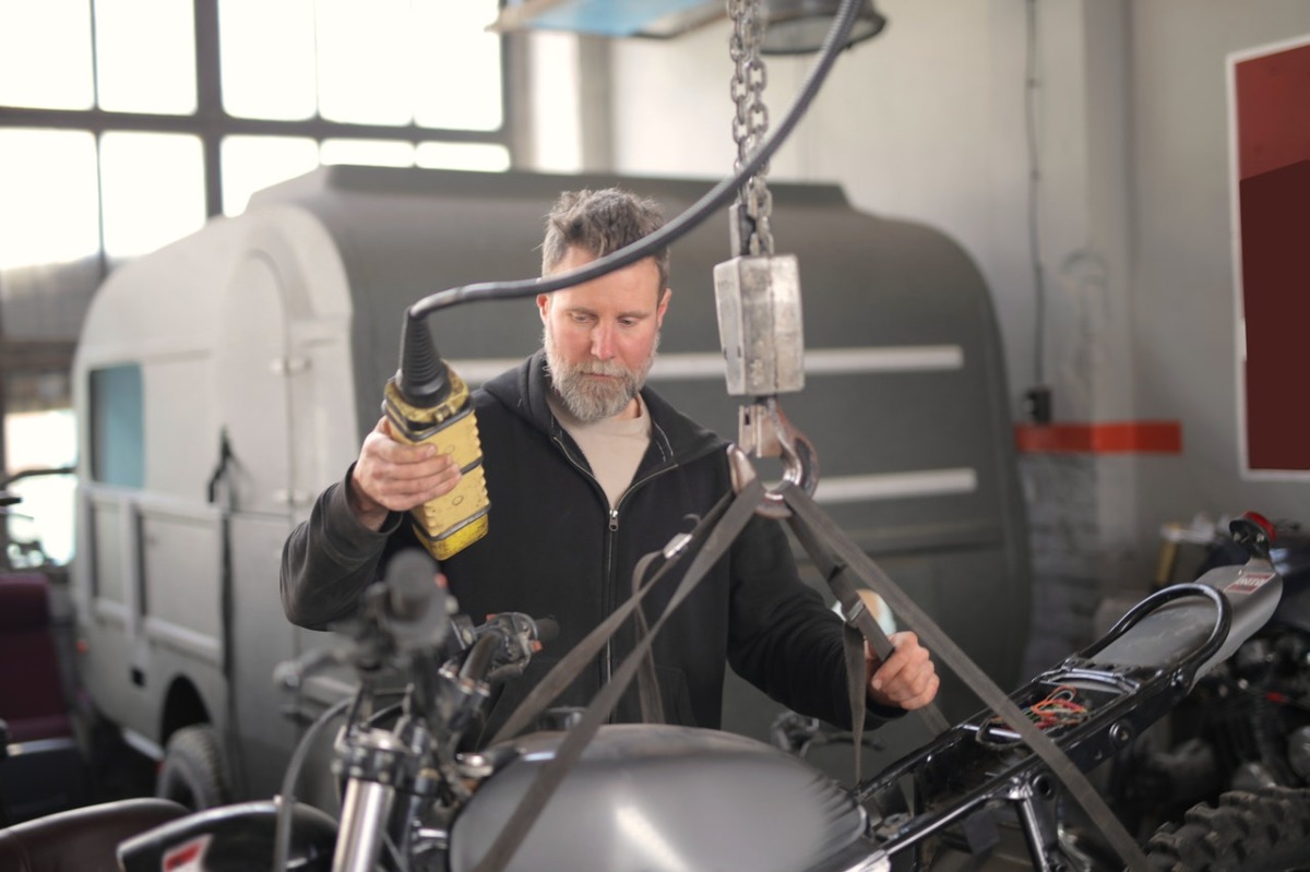 man working with hydraulics